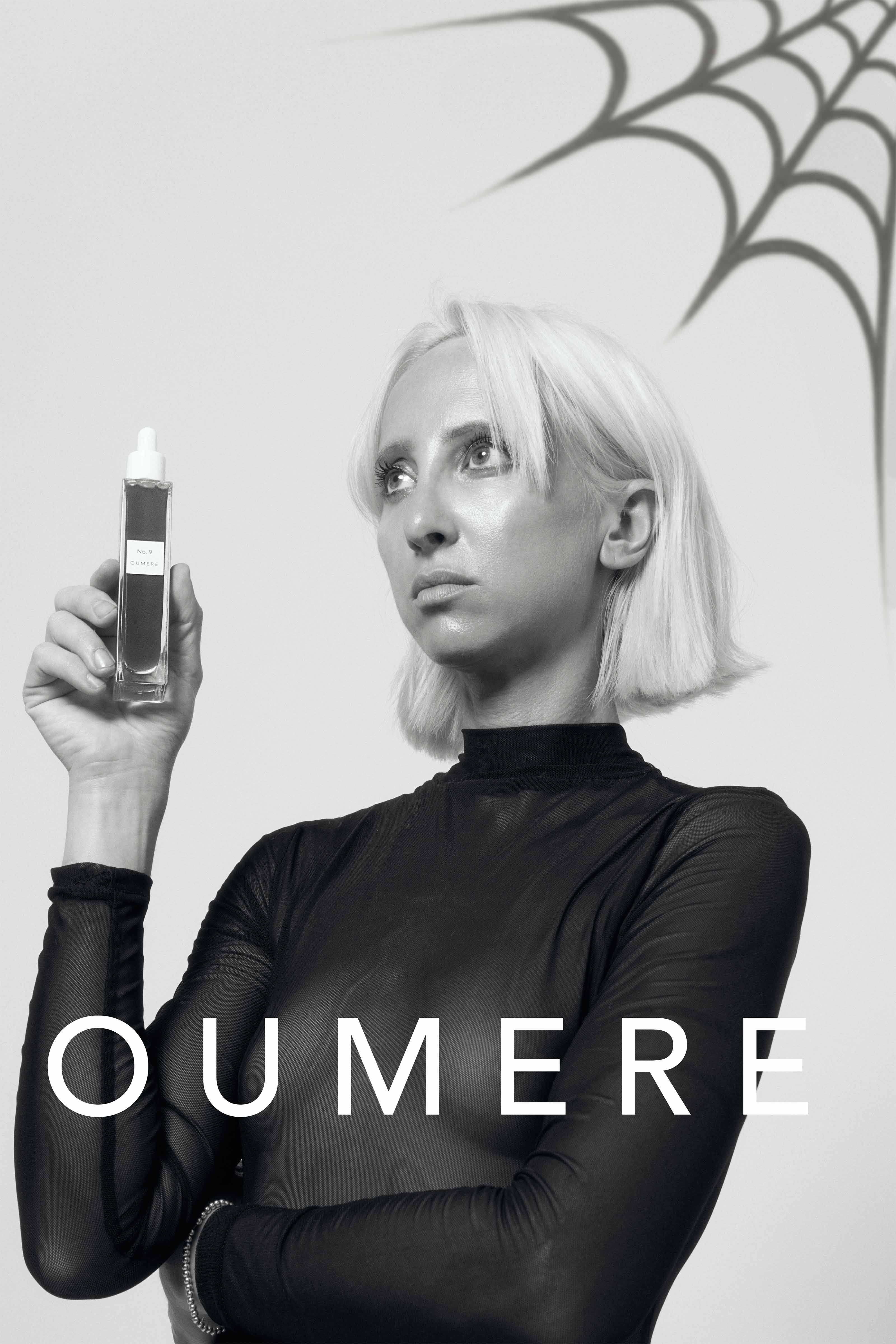 Wendy Ouriel Holding OUMERE No. 9 Bottle