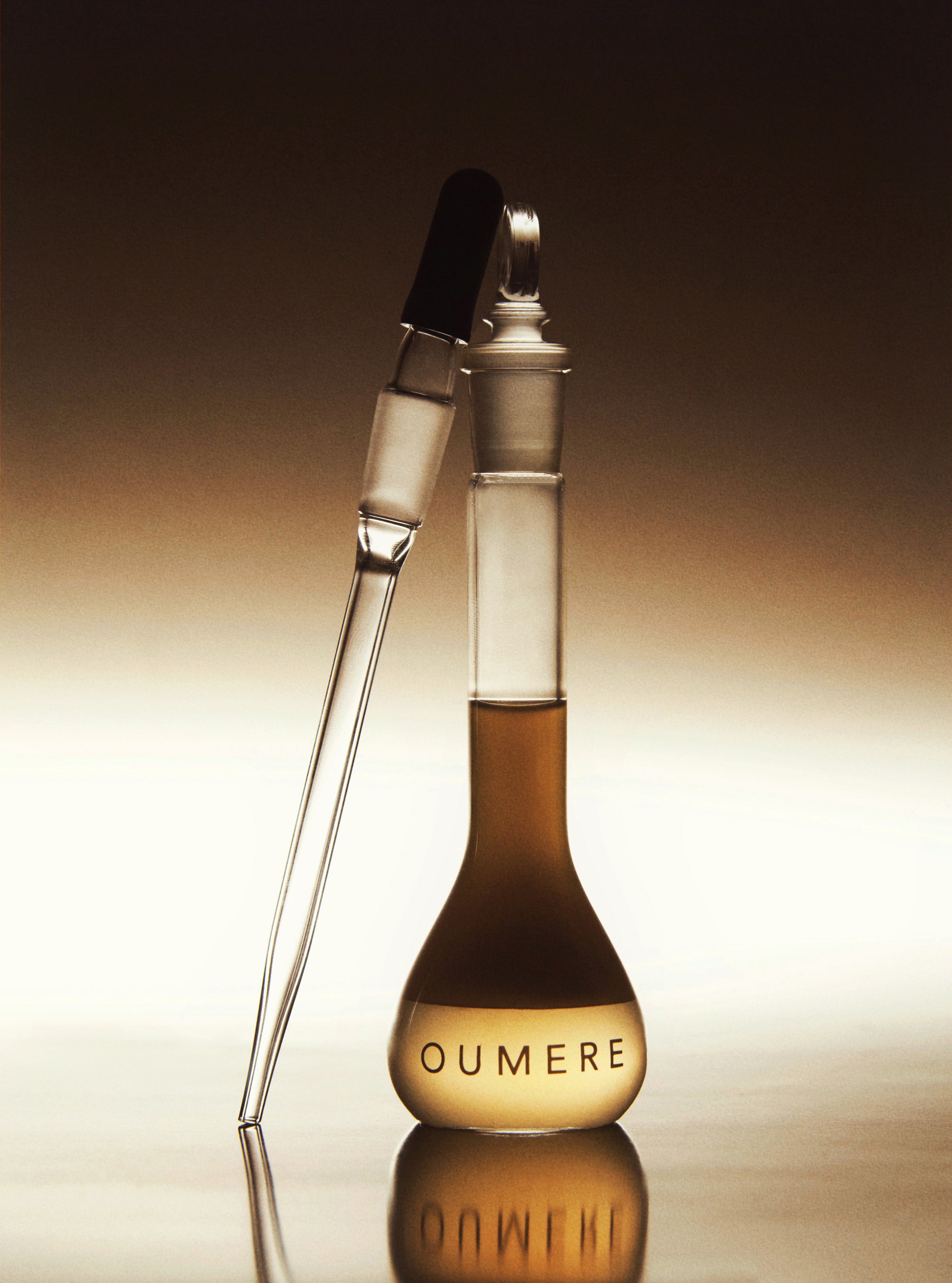 Glass bottle of Serum Bioluminelle with glass dropper